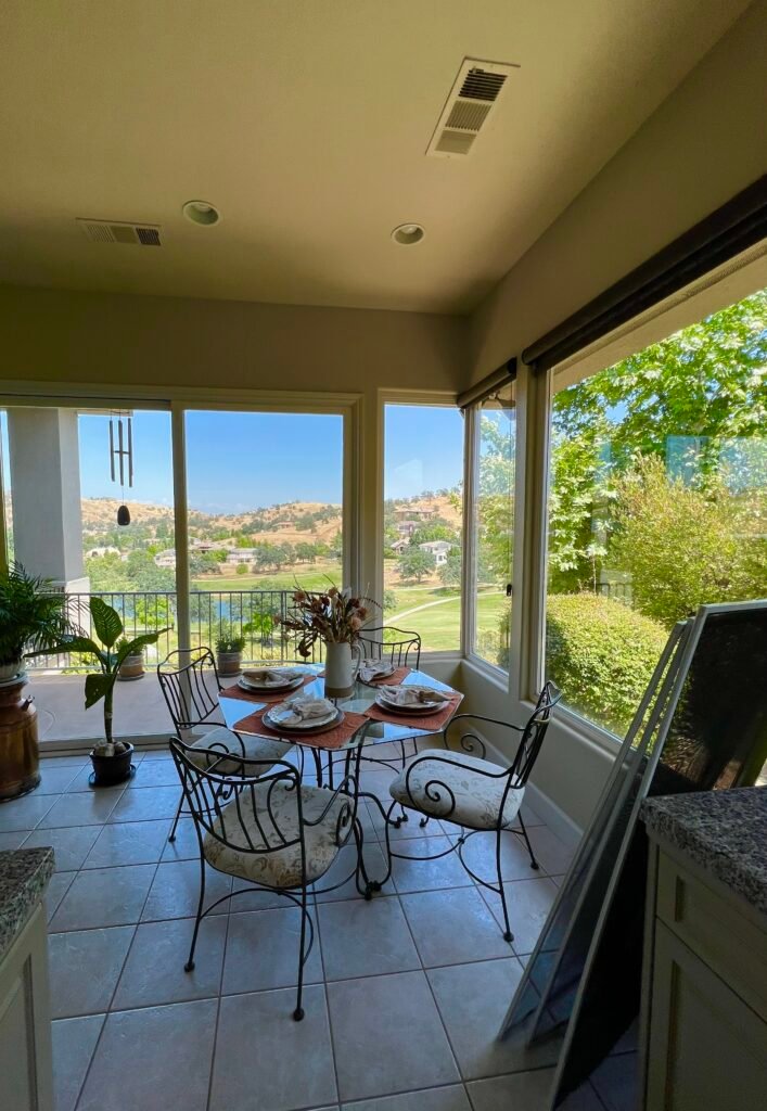 Sunroom with clean windows overlooking the hills
